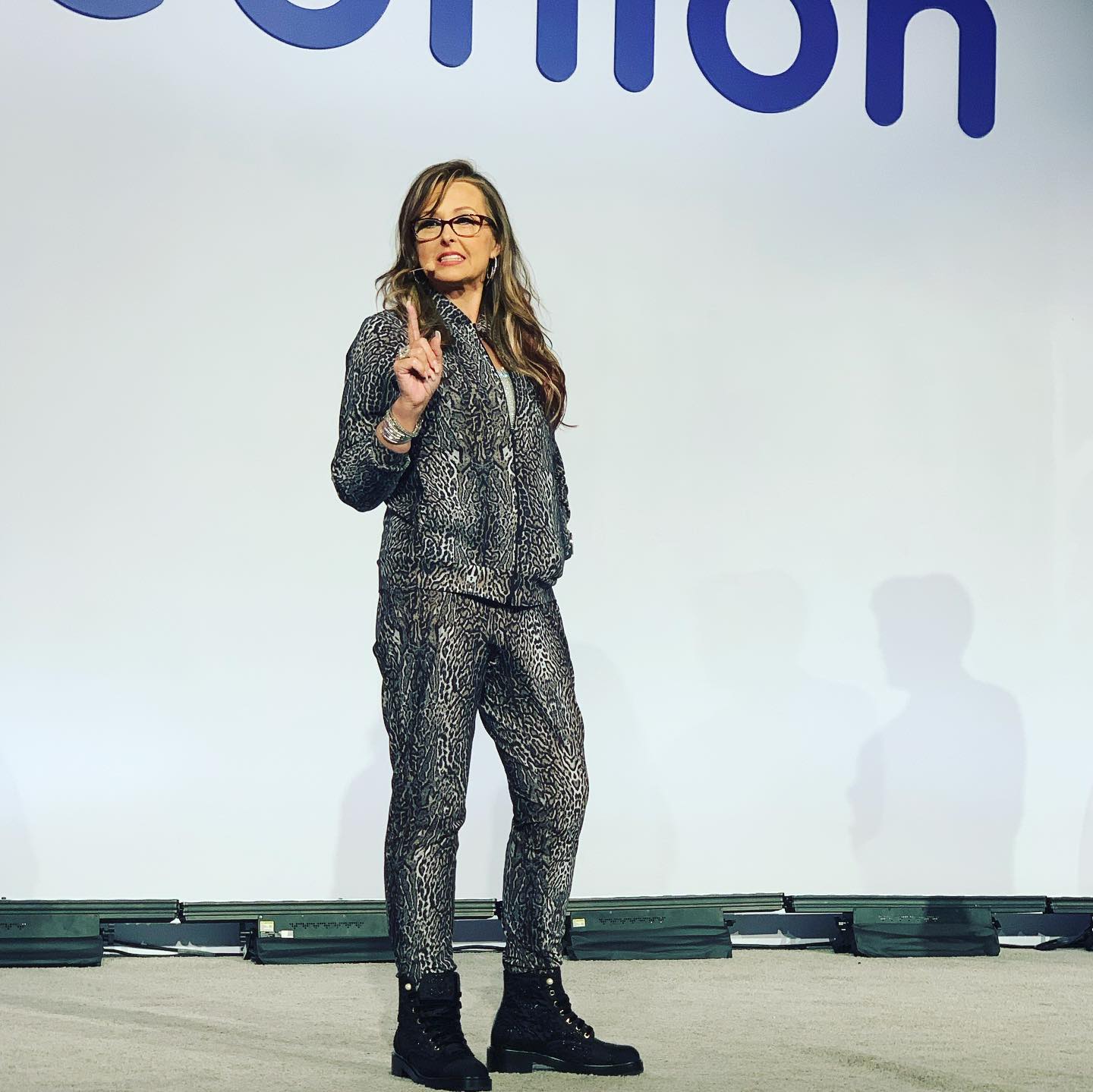 Angel Fletcher speaking on stage